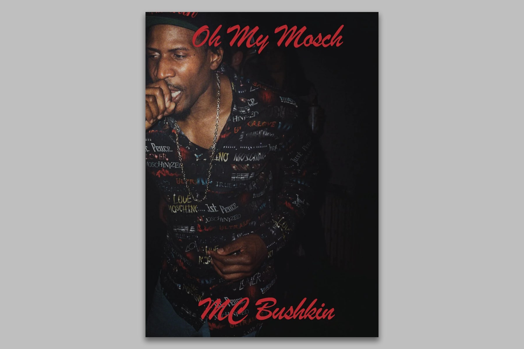 Cover of Oh My Mosch, with red lettering over a colour photograph of a man in a patterned shirt.